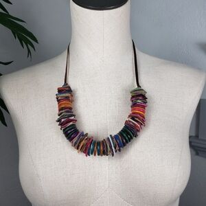 Multicolor Leather Layered Swatches with Wooden Buttons on a Leather Cord.